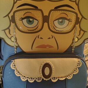 Loungefly Blue and Cream Character Backpack